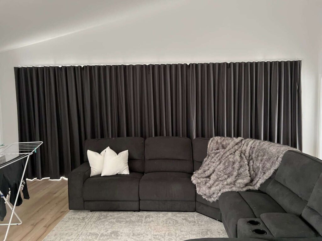 Modern blockout curtains fully drawn for maximum light control
