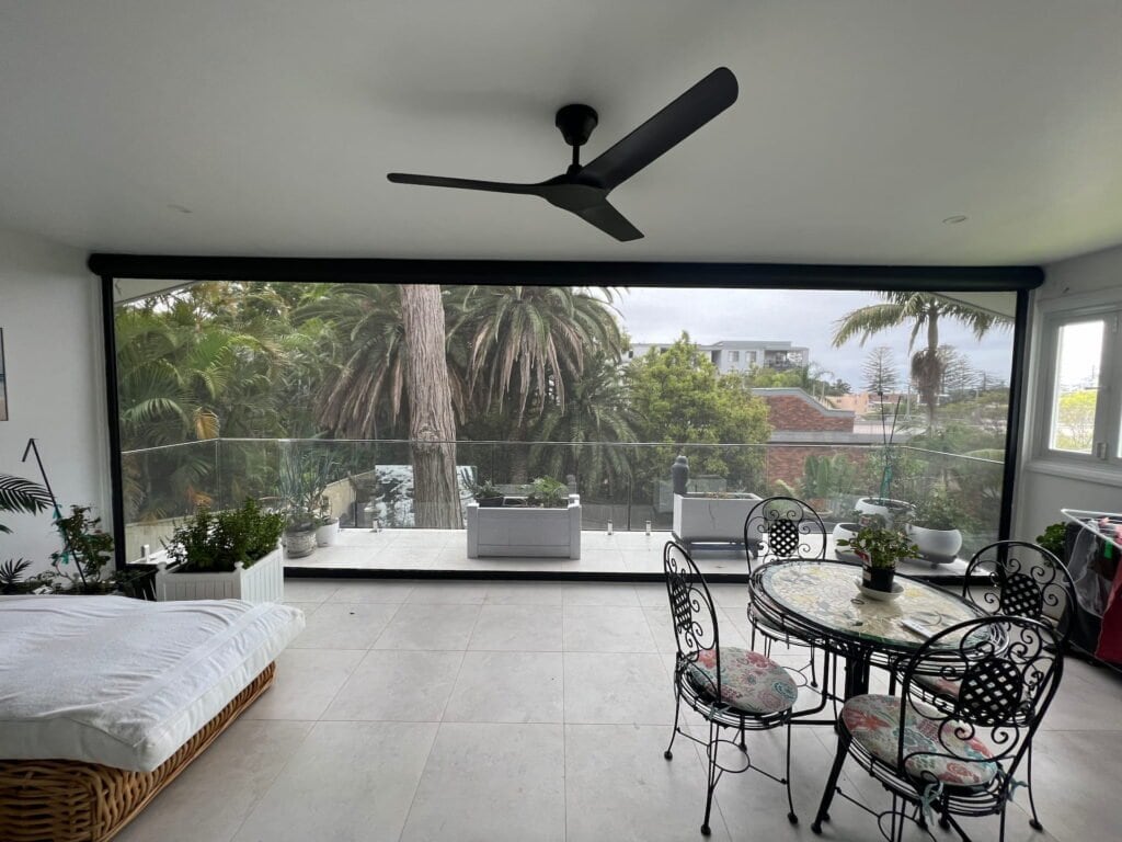 8.6m Outdoor Roller Blind 8.6 metre wide outdoor roller blind covering patio area