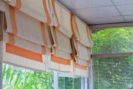 Panel Glide Blinds Central Coast – Sleek & Practical for Large Spaces Panel glide blinds installed across wide glass doors in a contemporary home
