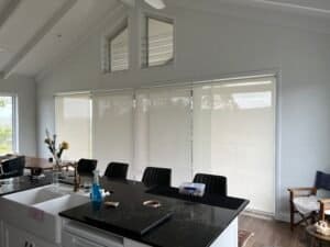 Sheer Roller Blinds – Central Coast Sheer roller blinds on large windows in a modern kitchen on the Central Coast