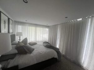 Elegant Sheer Curtains for Daylight and Privacy Soft sheer curtains allowing natural light to filter into the room