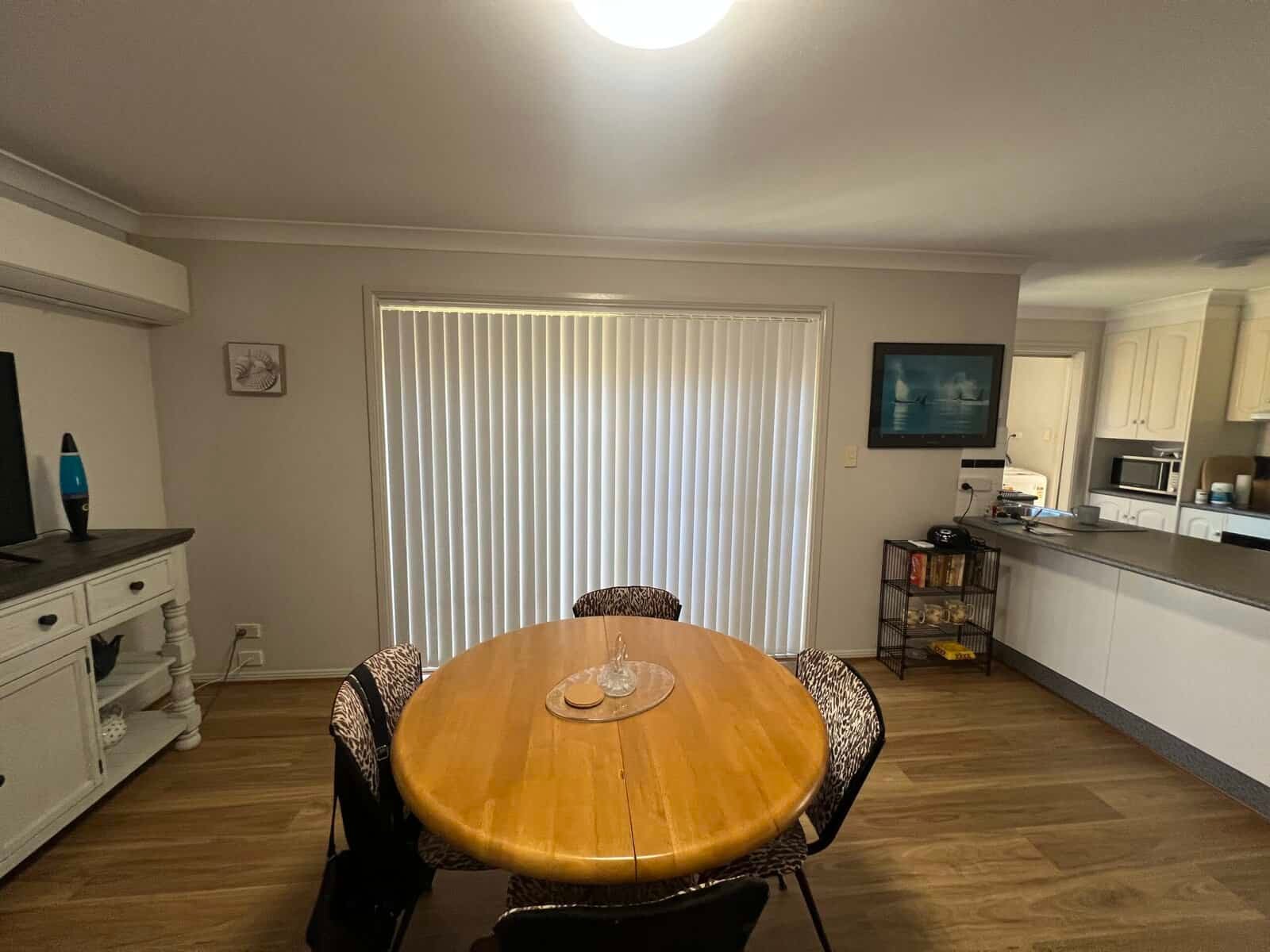 Vertical blinds on sliding door Central Coast – stylish, affordable, and practical window covering.