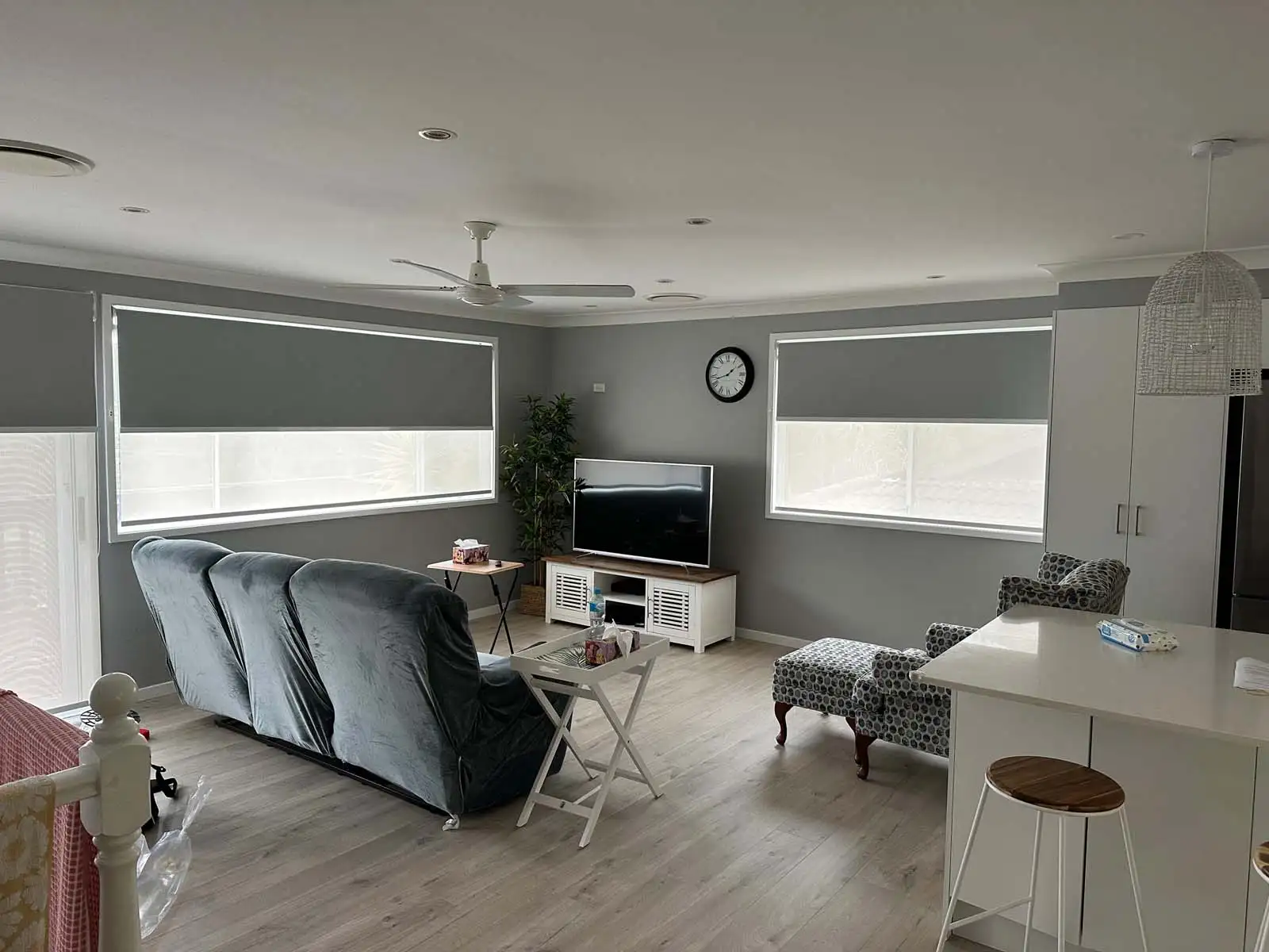 Double roller blinds providing enhanced privacy in a Central Coast living area with a sleek, modern design.