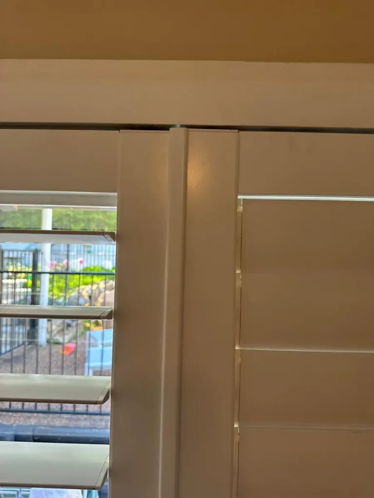 Plantation shutters offer heat and light control, helping to regulate indoor temperatures while maintaining natural light and privacy.