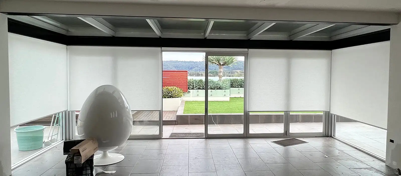 Light filtering roller blinds in a Central Coast penthouse – custom blinds by The Blind Crew offering privacy and soft daylight
