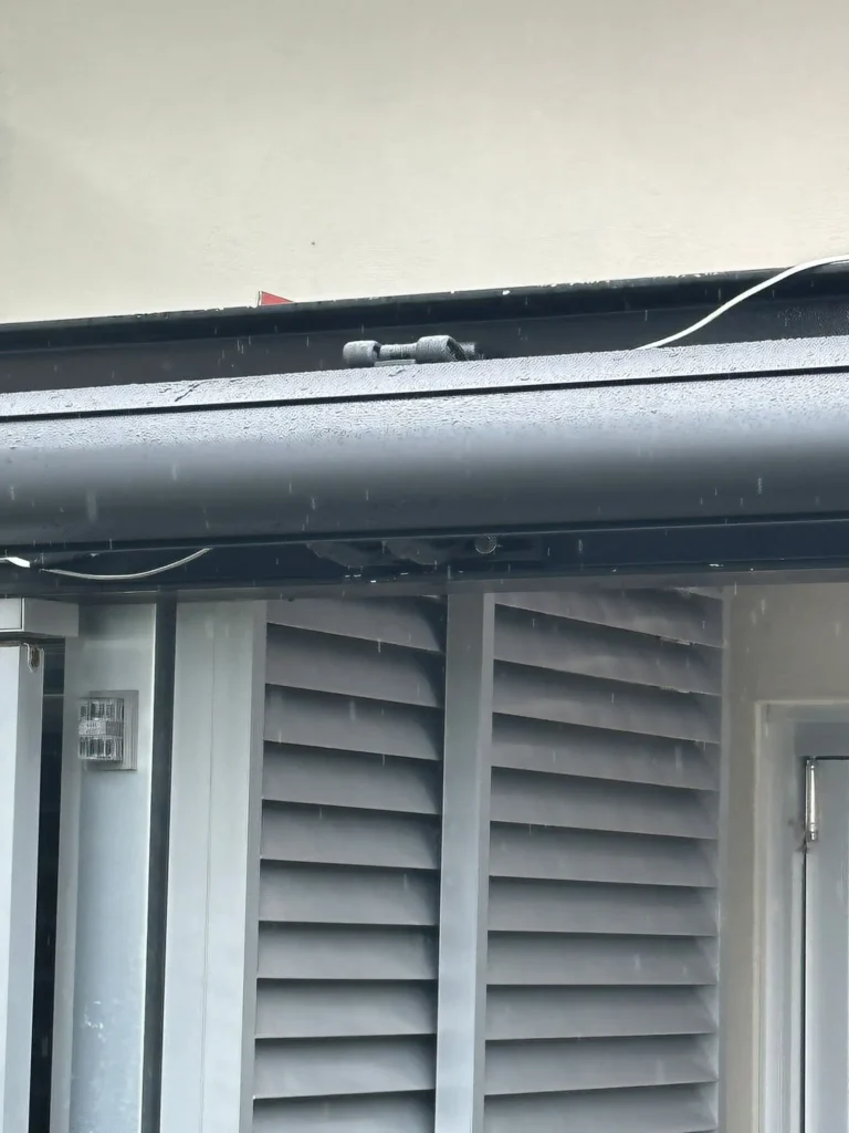 Plantation shutters for outdoors providing shade, privacy, and weather protection for patios and alfresco areas.