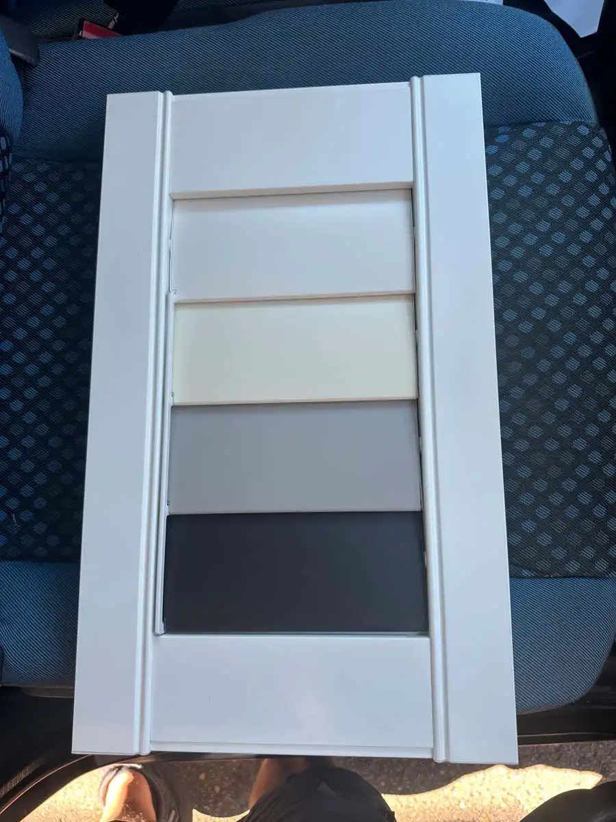 Aluminium plantation shutters Central Coast — colour options including white, charcoal, black, and grey finishes.