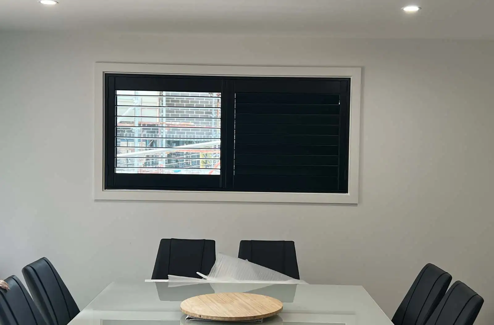 Elegant timber plantation shutters adding warmth, privacy, and timeless style to Central Coast homes. Timber plantation shutters Central Coast — custom hardwood shutters for coastal homes and modern interiors.