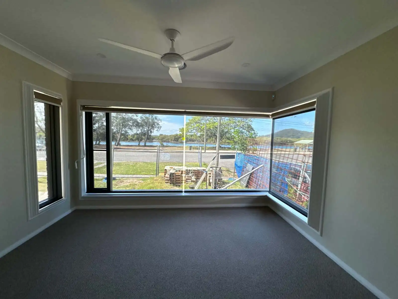 Sheer Roller Blinds Central Coast – Daytime Privacy with Natural Light Sheer roller blinds fitted on Central Coast windows providing daytime privacy while allowing soft natural light indoors.