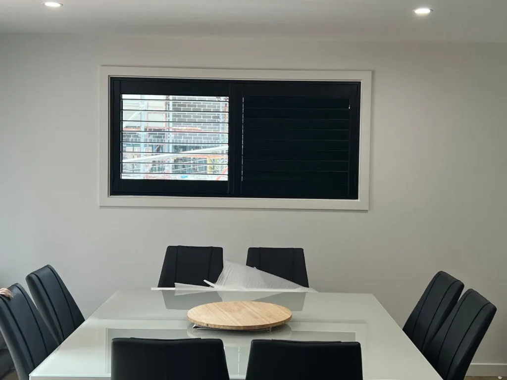 Timber plantation shutters crafted from premium hardwood for natural warmth and timeless elegance in Australian homes.